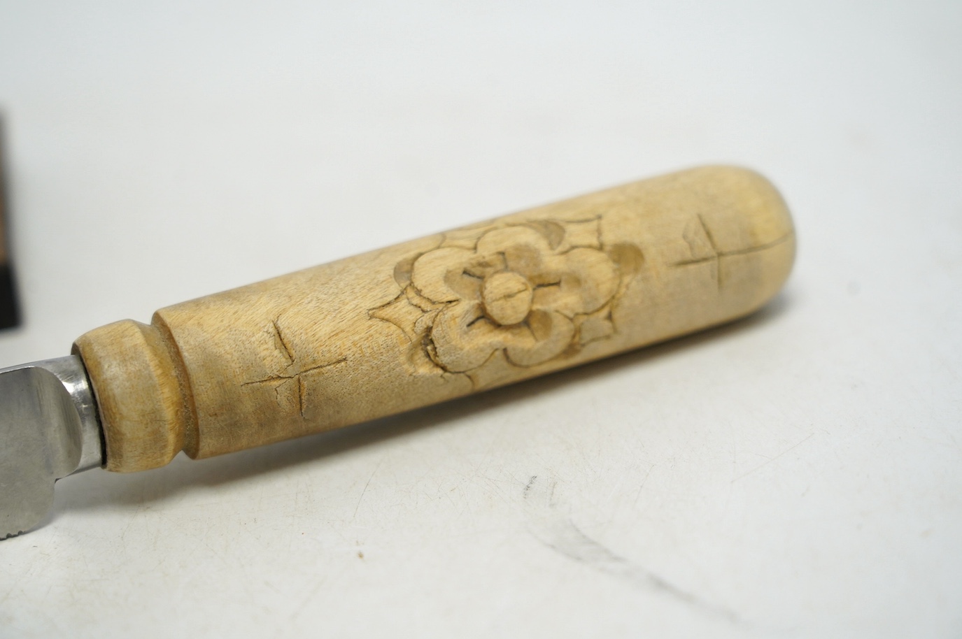 A Tunbridge ware obelisk thermometer, a Mauchline ware box and cover, and a carved bread knife, largest 32cm long. Condition - fair to good